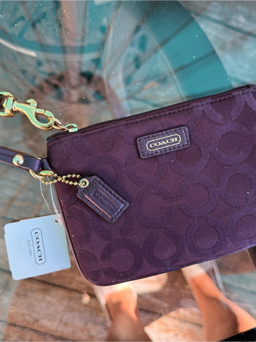 COACH Plum Signature Wristlet with Gold Hardware